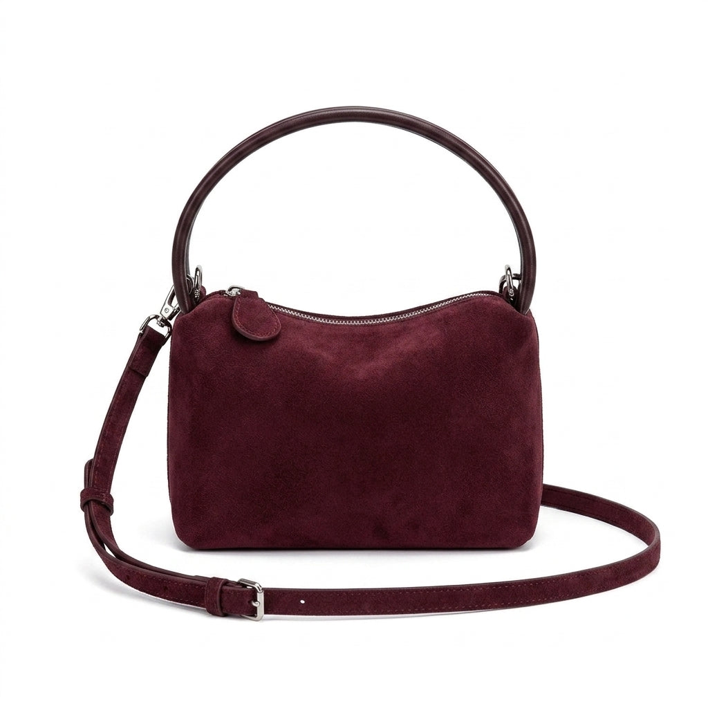 The Suede Mini Box Bag na cor burgundy em fundo branco