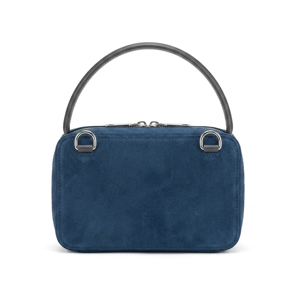 The Suede Mini Box Bag na cor blue em fundo branco